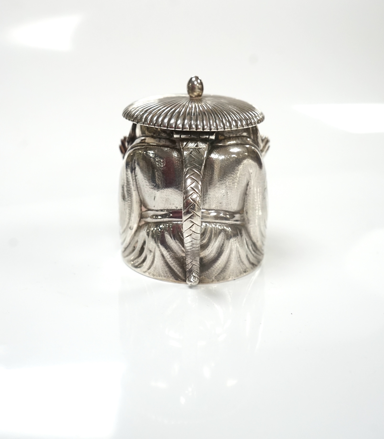 A Victorian novelty silver mustard, modelled as a Chinaman, with blue glass liner, by Richard Sibley II, London, 1847, height 85mm, 6.1oz. Condition - fair